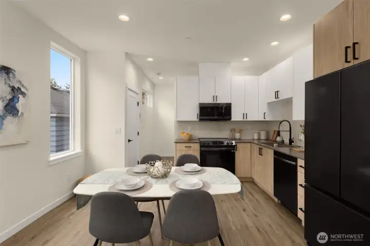 Thoughtfully designed for connection, this area merges kitchen, dining, and living spaces so you can cook, converse, and entertain without missing a moment.