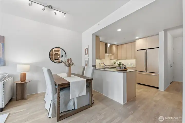 Here's a another look at the dining area off the stunning open kitchen.