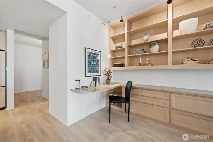 Another look at the den area off the main living area with a window looking out to the deck for natural light.