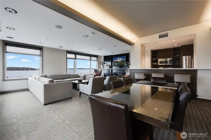 The beautiful club/party room also located on the 6th floor with a full kitchen to cater events leads to the spectacular rooftop view deck!