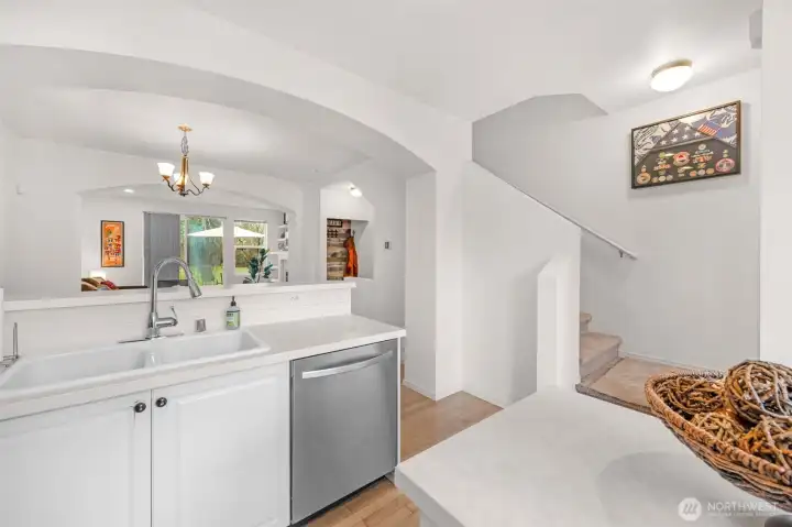 The bright kitchen showcasing the seamless connection to the main living areas, a true open layout designed for gathering and easy everyday living.