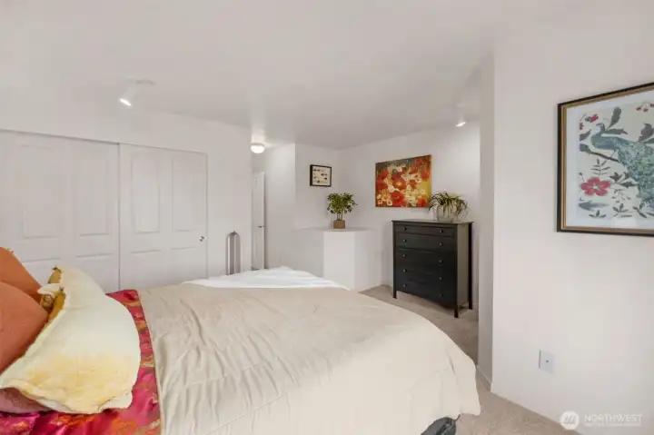 Comfortable and private primary suite offering room to recharge, unwind, and create your own peaceful sanctuary.