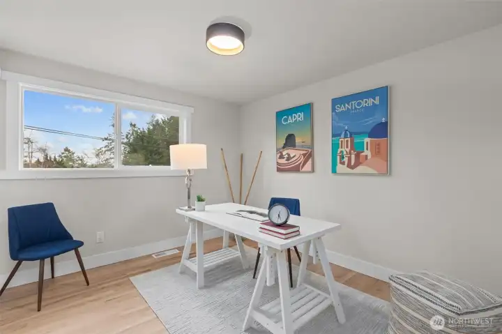 Additional upper-level bedroom ideal for guests, office, or hobbies.