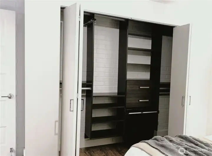 Primary Closet with custom organizers to maximize space! (photo taken when home was vacant)