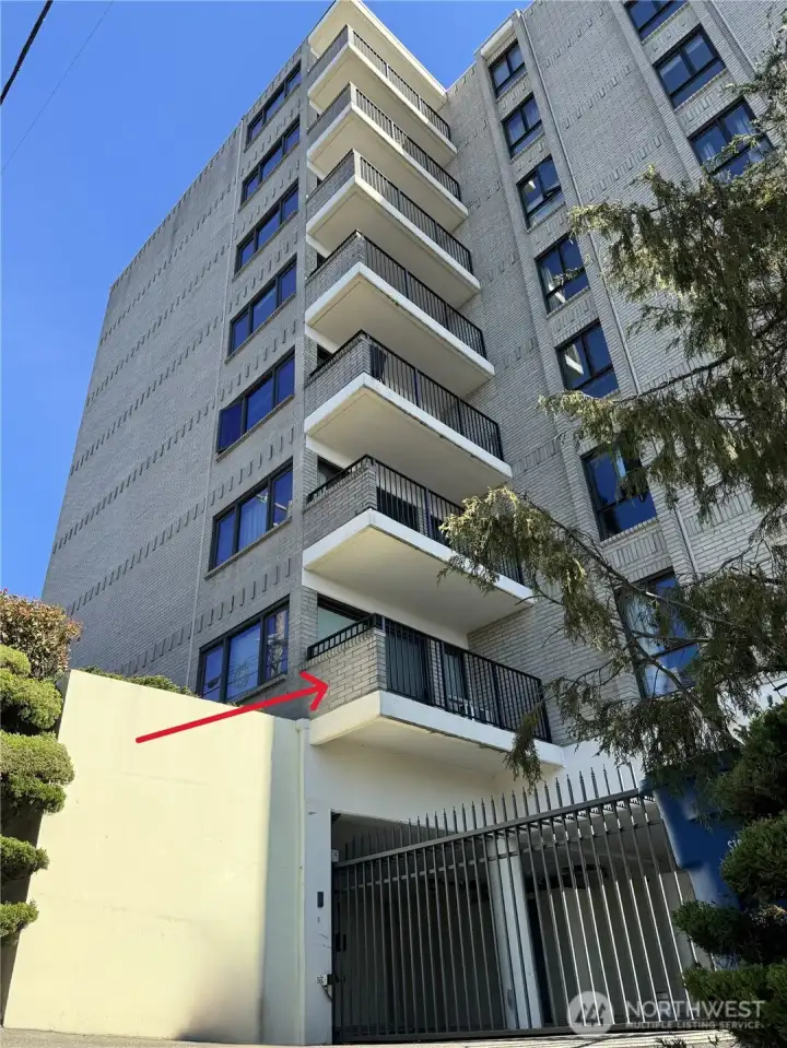 unit 101 has an elevated West facing deck with views to Elliott Bay and beyond! Gate to Secure parking deck B.