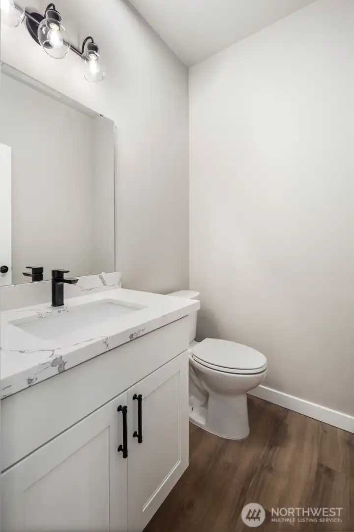 Upstairs guest powder room.