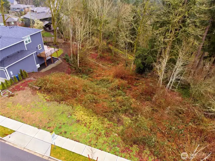 Shovel-ready 9,021 sq ft vacant lot in desirable Newcastle with full permit approvals and architectural plans for a 5,268 sq ft, 6-bed, 5-bath modern home with 3-car garage.