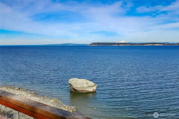 The "White Rock" is in front of this beautiful property has an expansive water-side yard and a backdrop to live for. Come see 15 White Rock for yourself!