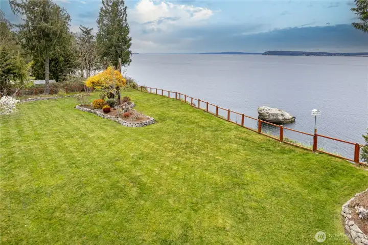 There's so much value in this 5-acre home on 202' of glorious waterfront!