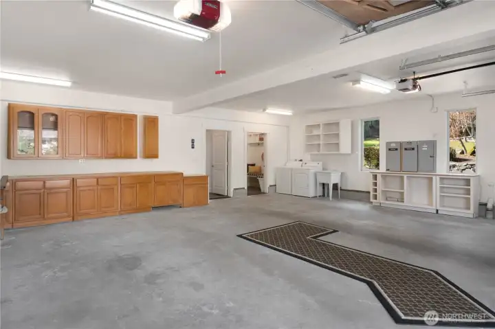 The over-size garage has electric heat, a second washer/dryer, great lighting, lots of cabinetry and lots of space.