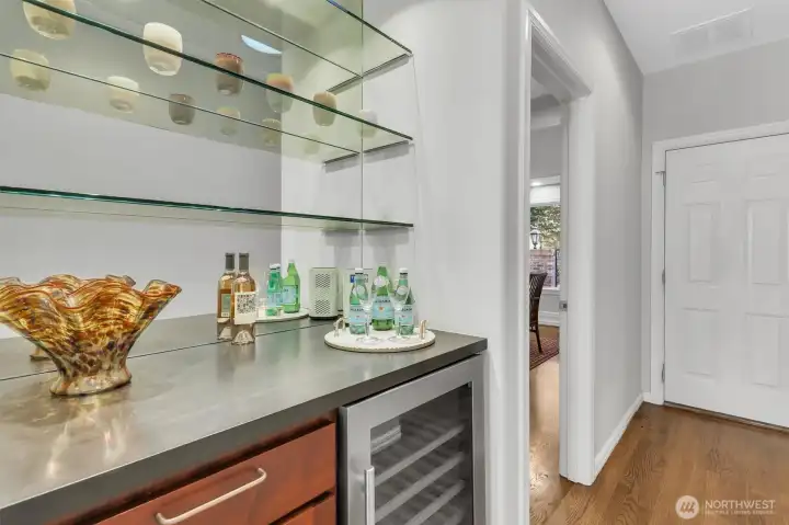 Wine refrigerator located off the kitchen