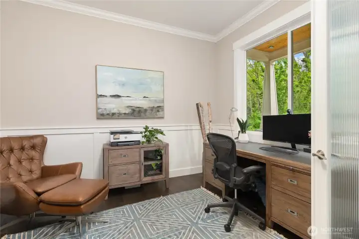 French doors invite you into a dedicated and luxurious office