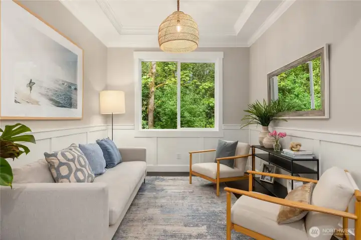 Designed as a formal dining room - sellers chose to have a charming sitting room