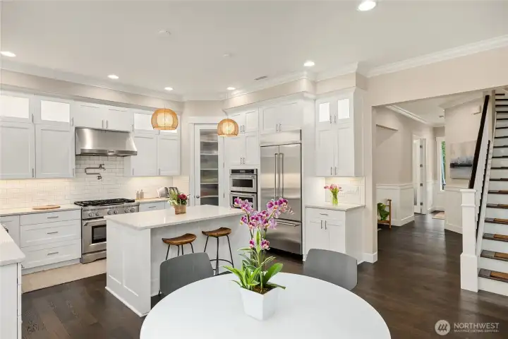 Glass door in center of frame is a roomy pantry