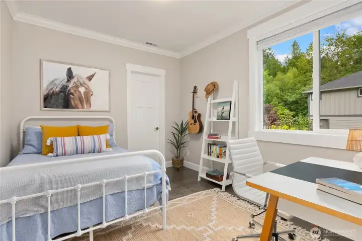 Third of 4 bedrooms with walk in closet