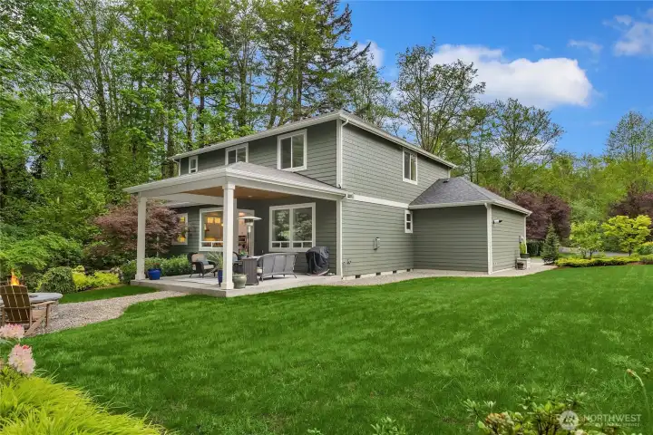 A reminder that this home is set on 2.24 acres, so there is plenty of room for beautiful lawns, gardens and the trees provide privacy