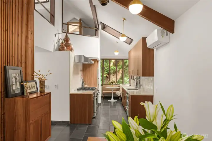 Soaring ceilings greet you in the stunning new kitchen. Mini split provides AC