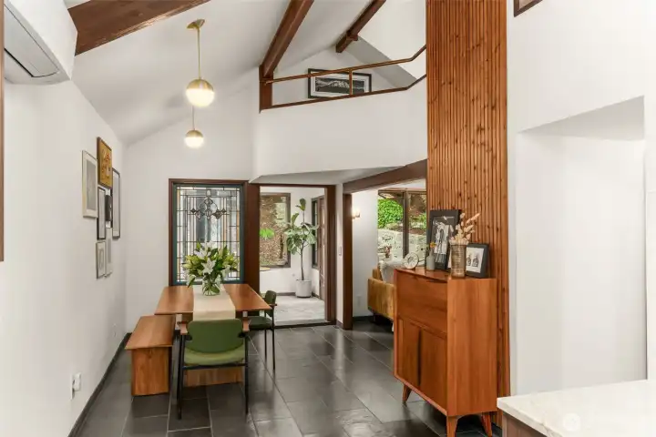 Dining room featuring original stained glass window