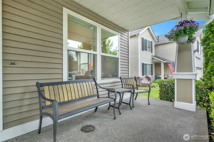 Covered front porch with sitting space.