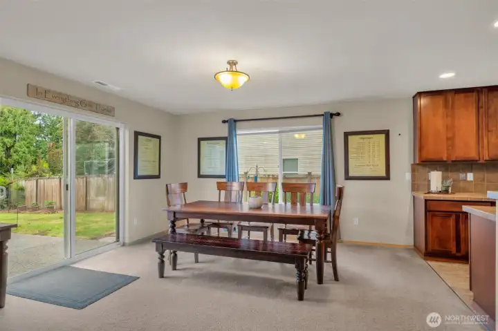 Dinning space with entry to the fully fenced backyard.