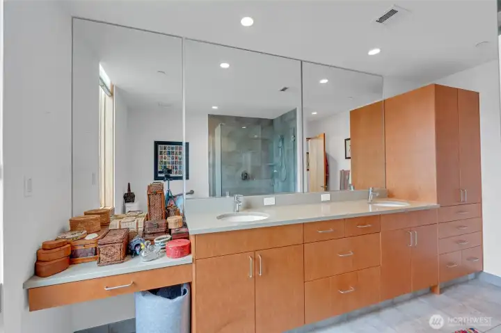 Ample storage in the primary bathroom. Ample storage in the primary bathroom.