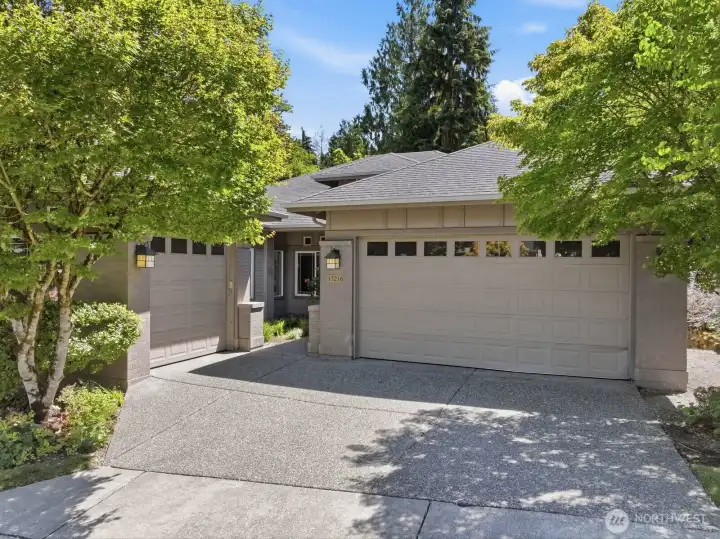 Three car garage and additional parking in the driveway Three car garage and additional parking in the driveway