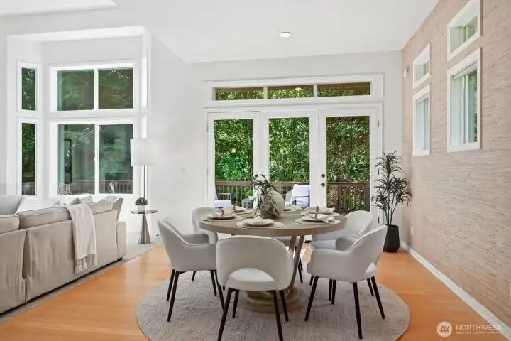 The dining room conveniently leads out to deck The dining room conveniently leads out to deck