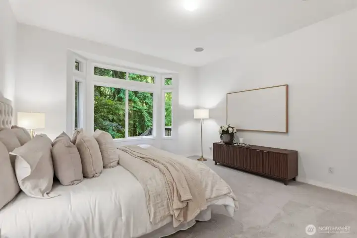 The primary bedrooms backs the greenbelt for added privacy The primary bedrooms backs the greenbelt for added privacy
