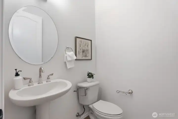 Well-placed powder room near the front entry Well-placed powder room near the front entry