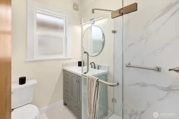 Beautifully renovated in 2026, this main level bathrooom includes modern finishes, a step-in shower, and thoughtful design that elevates everyday routines. Beautifully renovated in 2026, this main level bathrooom includes modern finishes, a step-in shower, and thoughtful design that elevates everyday routines.