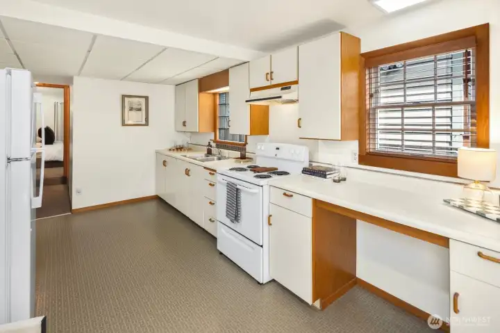 Functional, spacious, and full of storage, the kitchen offers everything needed for comfortable day-to-day living. Functional, spacious, and full of storage, the kitchen offers everything needed for comfortable day-to-day living.