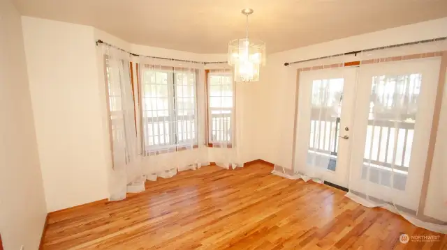 Formal Dining room also has French doors leading to the east deck