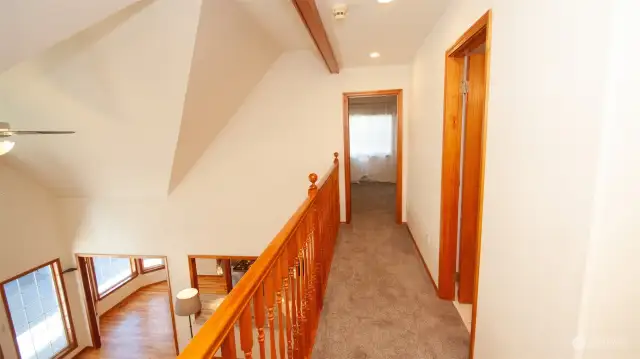 Balcony upstairs leads to a full bath & 2 ample sized bedrooms