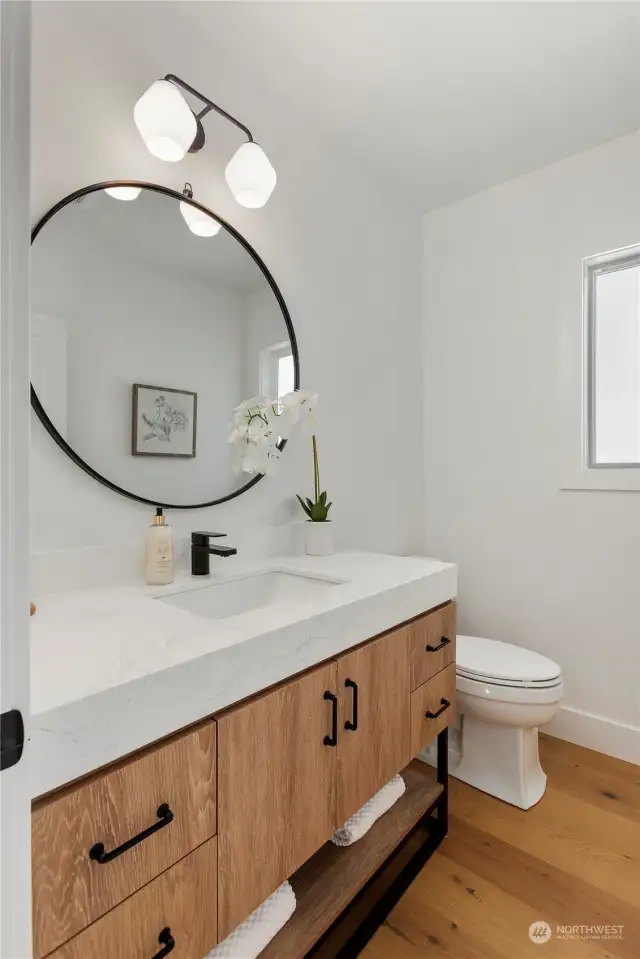 Fully renovated and new this powder room is stunning!