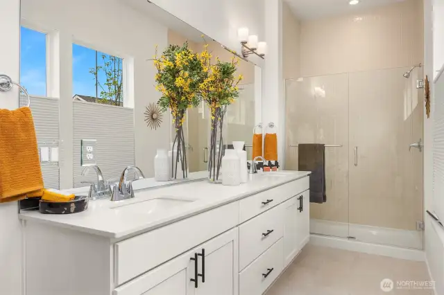 Primary Bathroom, dual vanity and luxurious shower.  Window coverings included