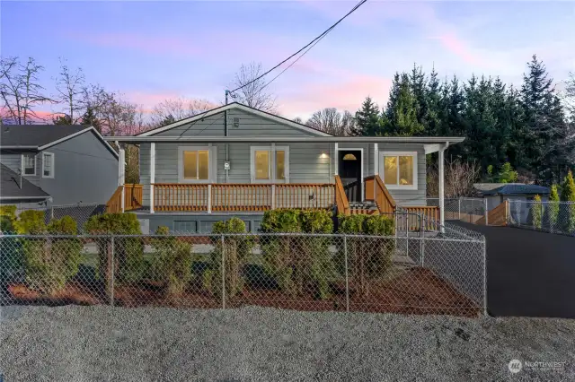 Street View w/Newly Sealed Driveway on the Right. It may look small from the front but it's going to surprise you!