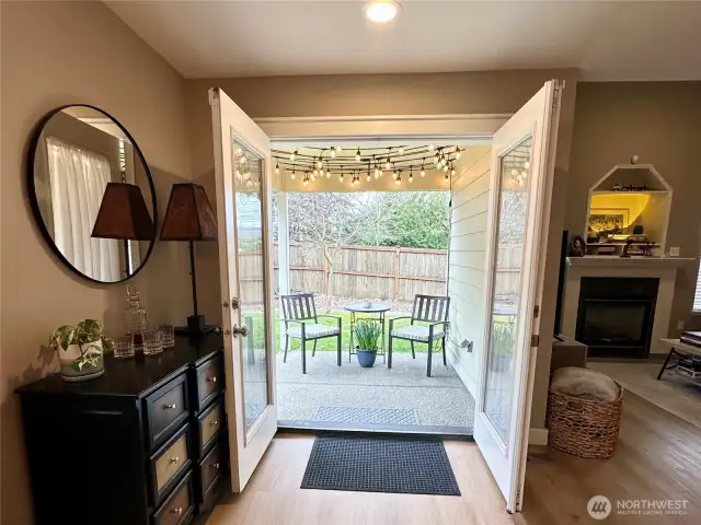 French door that open to the covered back patio