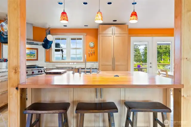 Butcher block kitchen island with built in outlet