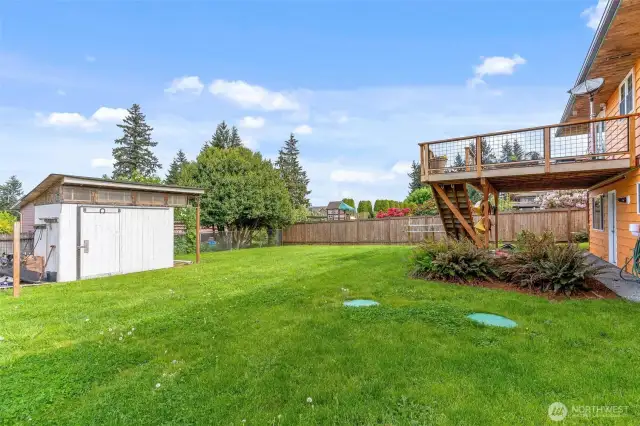 Flat, fully usable backyard—ideal for entertaining