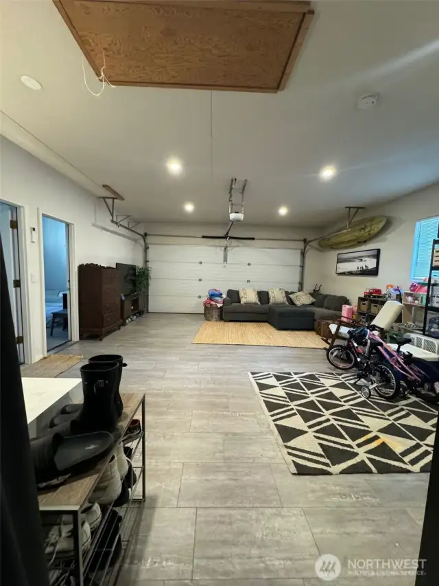 Garage has 2 bedrooms and common space that can also be used for 1 car parking.