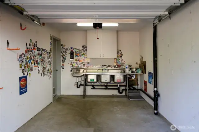 Former owners set up a home brewery in the attached garage, with Department of Agriculture approved sink.