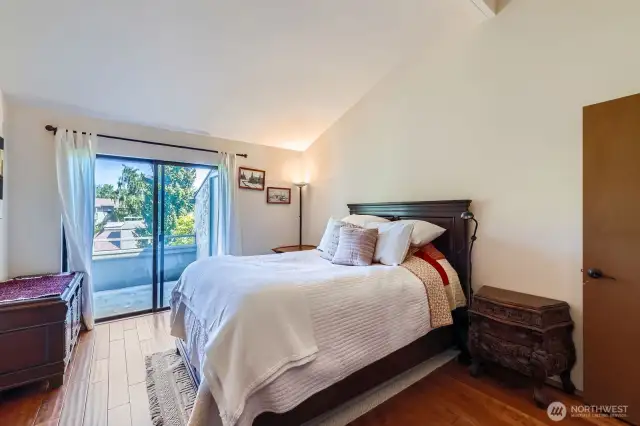 The oversized second bedroom boasts peaceful views, ample closet, and beautiful maple hardwood floors.