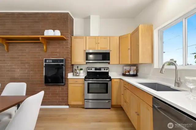 Brand new quartz countertops; stainless steel appliances