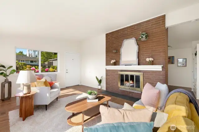 Gorgeous brick wood-burning fireplace adds so much character!