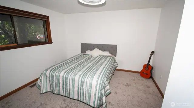 Primary Bedroom on Main. New carpet & floor molding recently installed