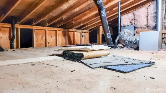 Interior of garage not shown as sellers are still moving out. This area is accessible through the garage & also the lower basement area. Immense storage space & this area holds the Furnace.