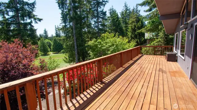 Large deck for entertaining & enjoying this PNW territorial & golf course views. Such a peaceful setting!