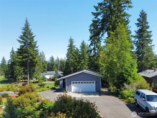 Garage has 2 entry doors on each side. The garage lift door is on an auto system.