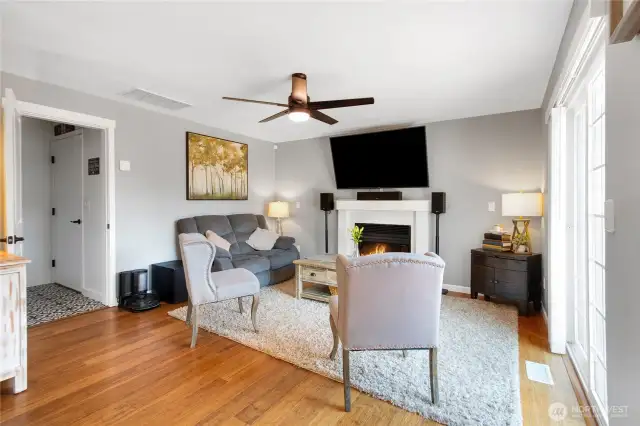 Family room with gas fireplace and laundry room is off to the left.