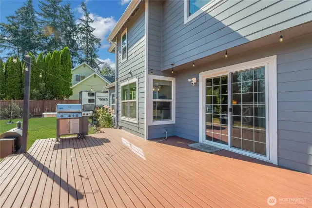 Large stained deck for all your gatherings. Grass enhanced.